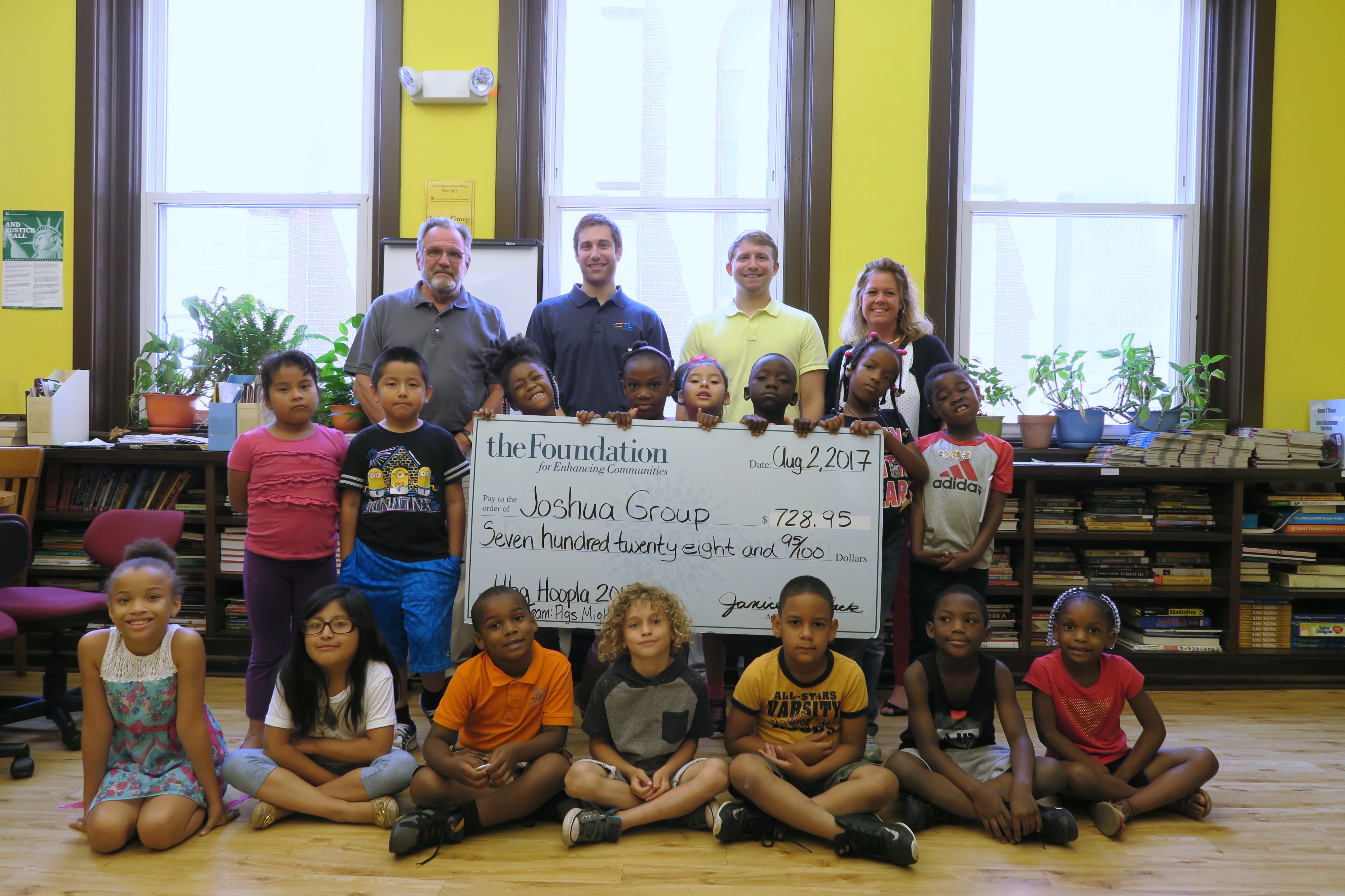 Harrisburg Hoopla Team Presents Check to Joshua Group